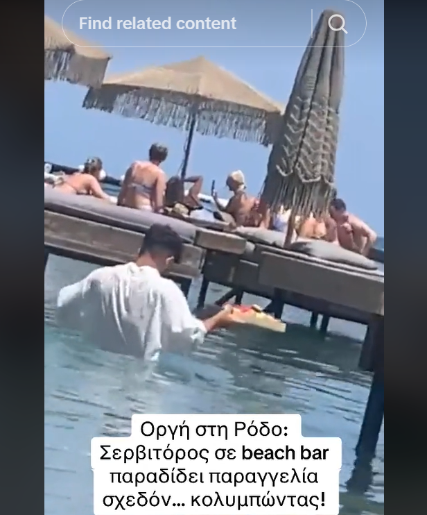 (ВИДЕО) Келнер влегува во водата до гуша за да услужи гости во ексклузивен бар на Родос